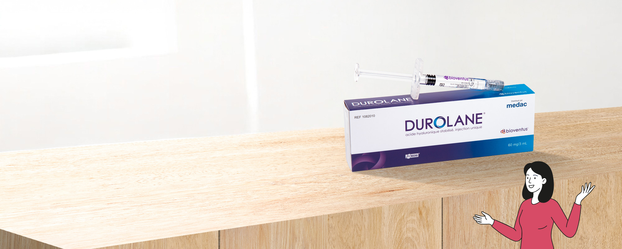 Boîte Durolane avec seringue d’acide hyaluronique posée sur un meuble, illustrant le packaging du dispositif injectable.
